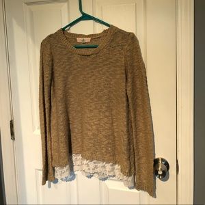 Beige knitted sweater with lace bottom